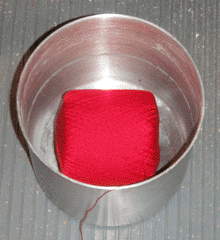 Yarn ball in bucket